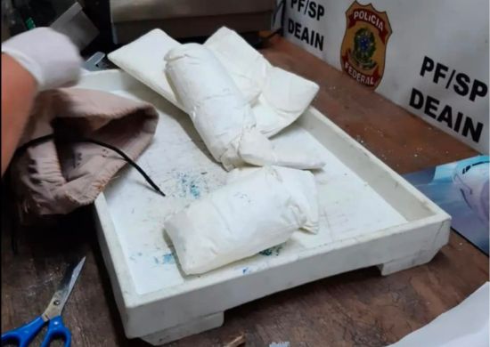 PF flagra passageira em Guarulhos com drogas introduzidas no corpo