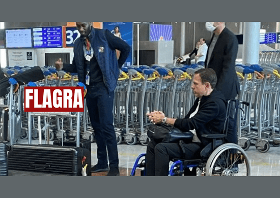 Doria é visto usando cadeira de rodas em aeroporto de Paris