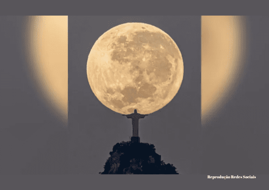Fotógrafo faz registro da lua “nas mãos” do Cristo Redentor